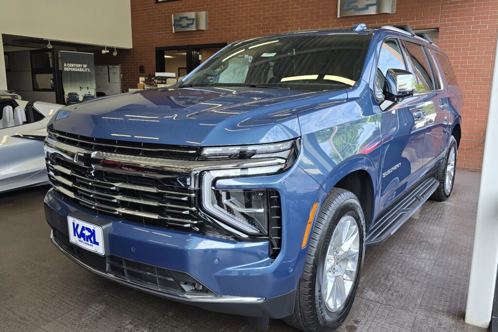 New 2026 Chevrolet Suburban on the showroom floor at Karl Chevrolet in New Canaan, CT